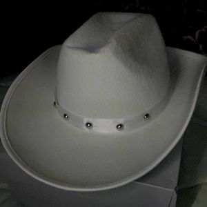 White hat with a ribbon wrapped